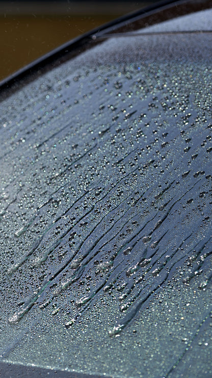 Windshield with water-repellent coating applied using Kimblade cleaning kit